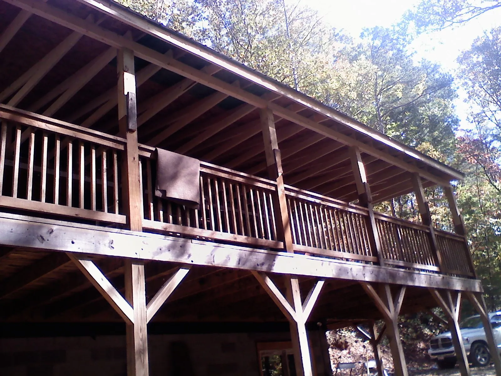 Timber framing under a new elevated porch and deck — Roof Leak Repair in East Palestine by Roofing Brothers